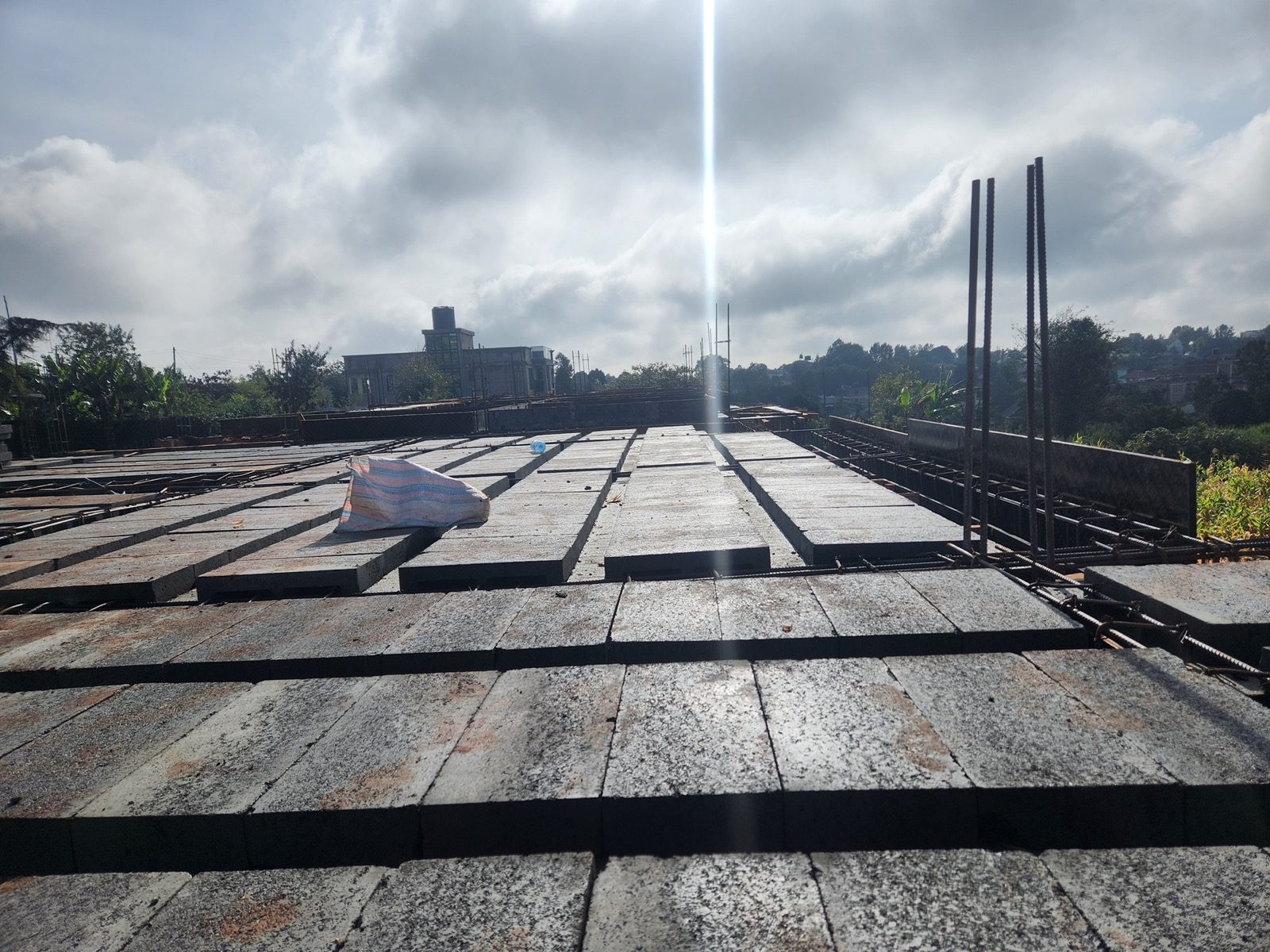 Suspended first-floor ribbed slab formwork, steel reinforcement, and conduit piping